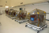 At Astrotech Space Operations in Titusville, Fla., the five probes of the THEMIS spacecraft are shown under cover prior to undergoing weeks of testing and launch preparations.